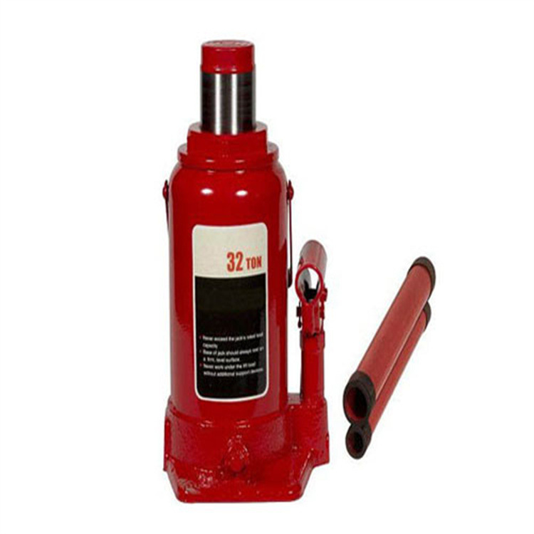 How is the descent control of a hydraulic jack performed